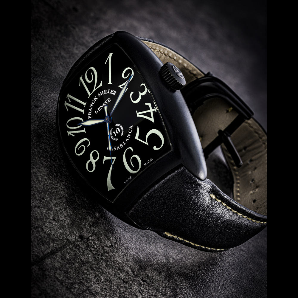 FRANCK MULLER. A LARGE PVD COATED STAINLESS STEEL LIMITED EDITION TONNEAU-SHAPED AUTOMATIC WRISTWATCH WITH SWEEP CENTRE SECONDS