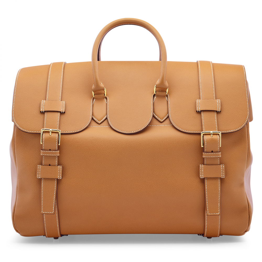 A GOLD CLÉMENCE LEATHER DRAG VOYAGE WITH GOLD HARDWARE - HERMÈS