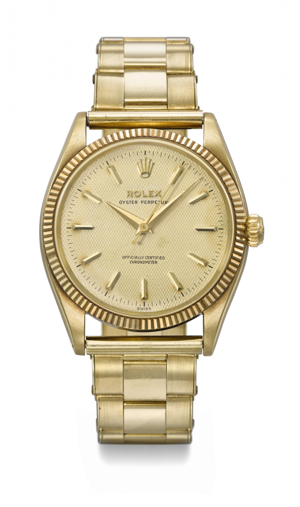 ROLEX. AN ATTRACTIVE 14K GOLD AUTOMATIC WRISTWATCH WITH SWEEP CENTRE SECONDS, HONEYCOMB DIAL AND BRACELET
