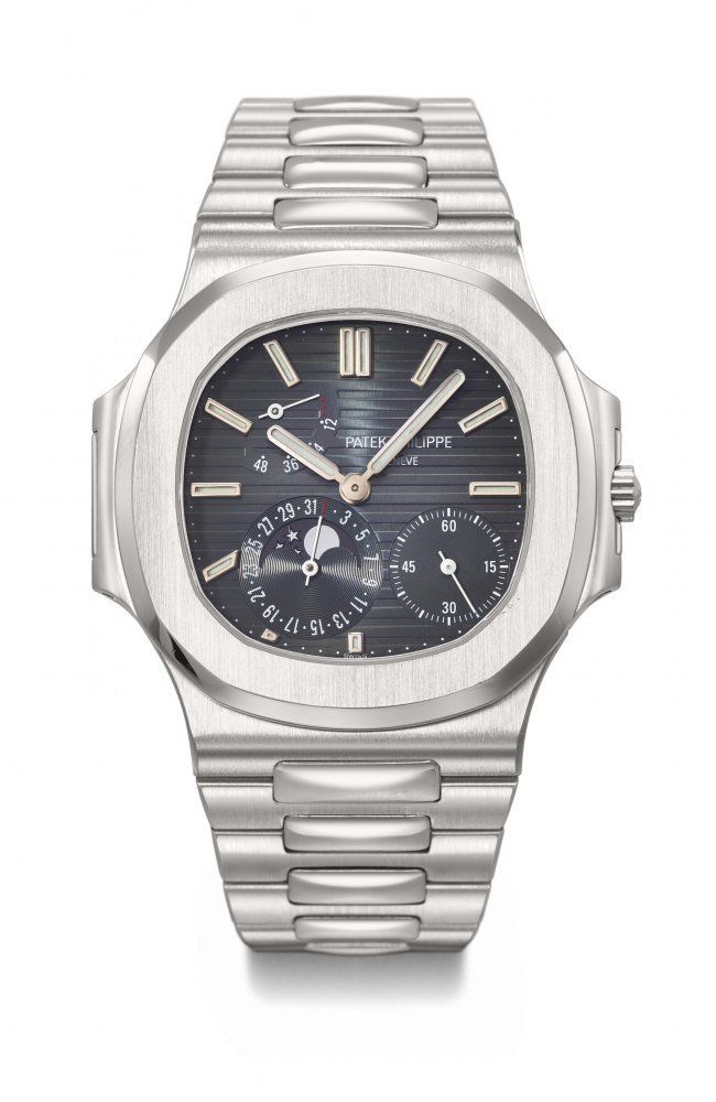 PATEK PHILIPPE. A VERY RARE STAINLESS STEEL AUTOMATIC WRISTWATCH WITH POWER RESERVE, MOON PHASES, DATE AND BRACELET