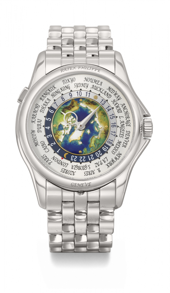 PATEK PHILIPPE. A VERY RARE AND HIGHLY ATTRACTIVE PLATINUM AUTOMATIC WORLD TIME WRISTWATCH WITH BRACELET AND 'NORTH POLE' CLOISONNÉ ENAMEL DIAL