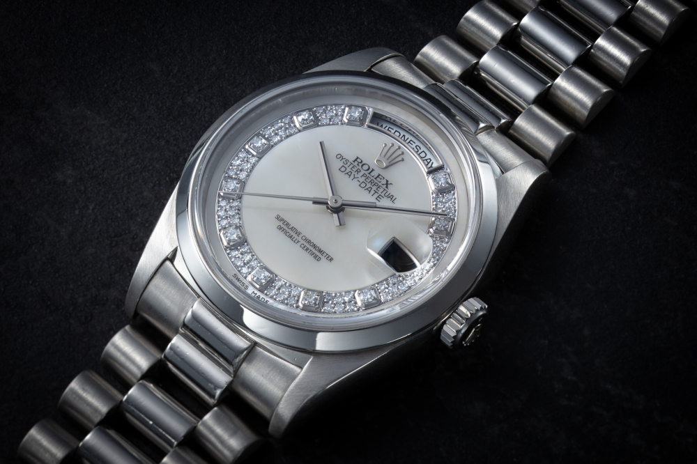 ROLEX, DAY-DATE REF. 18206, A PLATINUM AND DIAMOND WRISTWATCH WITH MOTHER OF PEARL DIAL, CASE NUMBER: U701’119, MOVEMENT NUMBER: 7'391'562 | Christie’s