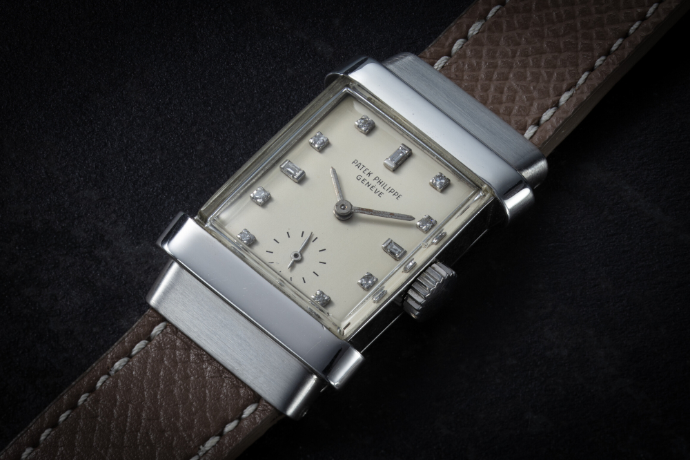 PATEK PHILIPPE, REF 1450 'TOP HAT', A CLASSIC AND VERY FINE PLATINUM WRISTWATCH WITH DIAMOND-SET DIAL, CASE NUMBER: 678'685, MOVEMENT NUMBER: 975'321 | Christie’s