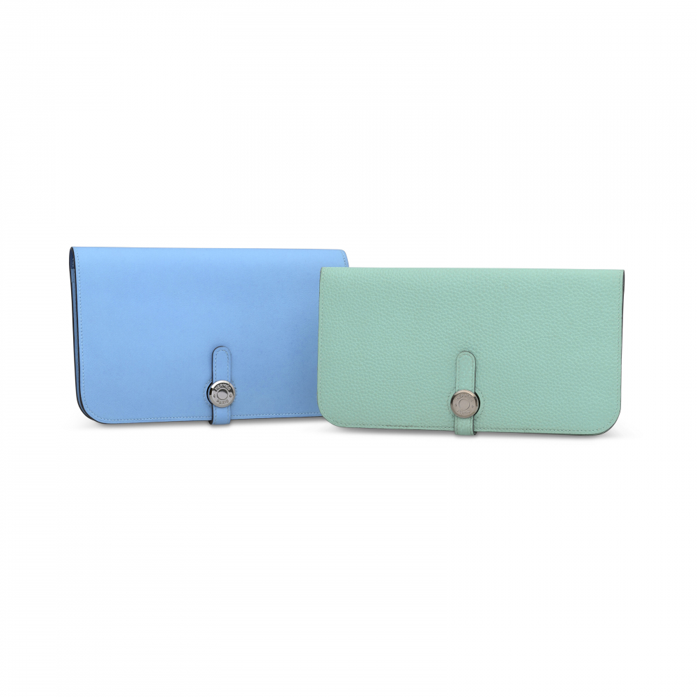 A SET OF TWO: A BLEU PARADIS BLEU FRANCE SWIFT LEATHER DOGON DUO WALLET WITH PALLADIUM HARDWARE A BLEU ATOLL TOGO LEATHER DOGON WALLET WITH PALLADIUM HARDWARE - HERMÈS