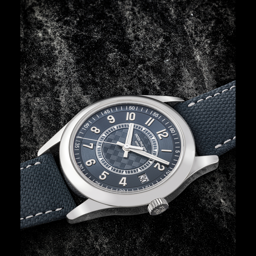 PATEK PHILIPPE. A RARE STAINLESS STEEL LIMITED EDITION AUTOMATIC WRISTWATCH WITH SWEEP CENTRE SECONDS AND DATE, MADE FOR THE OPENING OF THE NEW PATEK PHILIPPE MANUFACTURE BUILDING