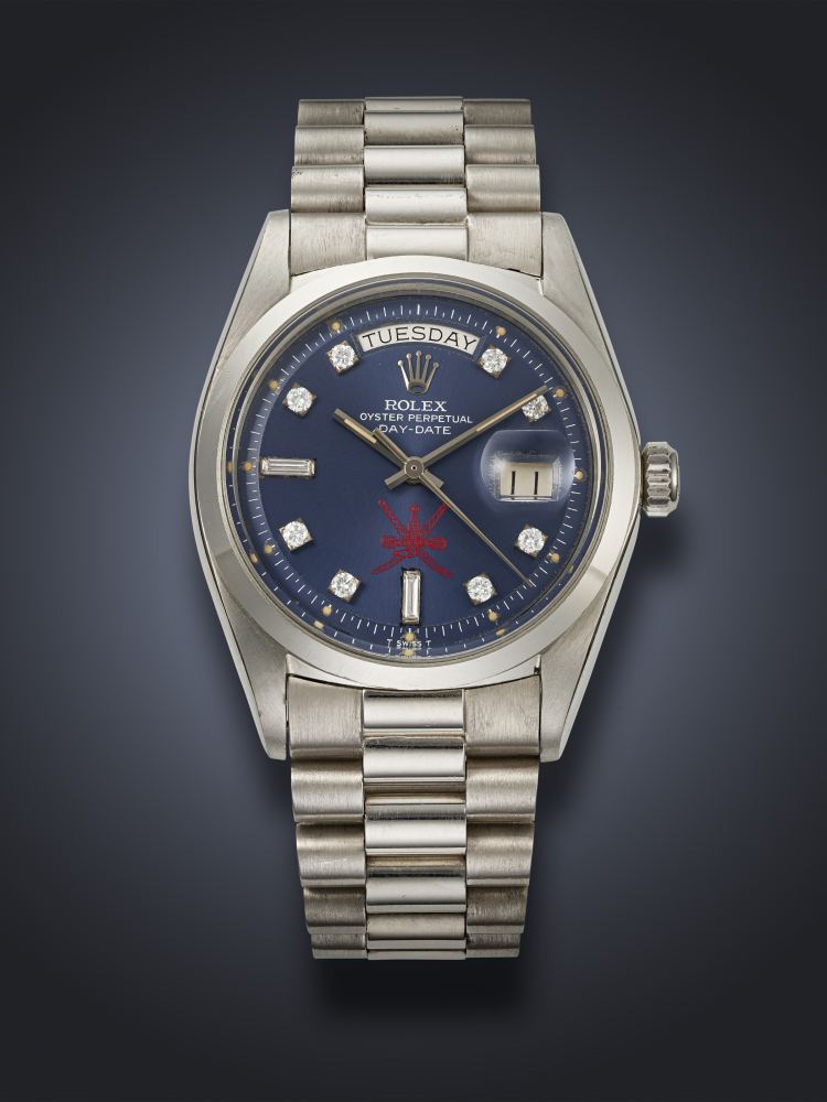 ROLEX, VERY RARE PLATINUM AND DIAMOND-SET 'DAY-DATE', WITH 'PIE-PAN' DIAL AND RED KHANJAR SYMBOL, REF. 1802