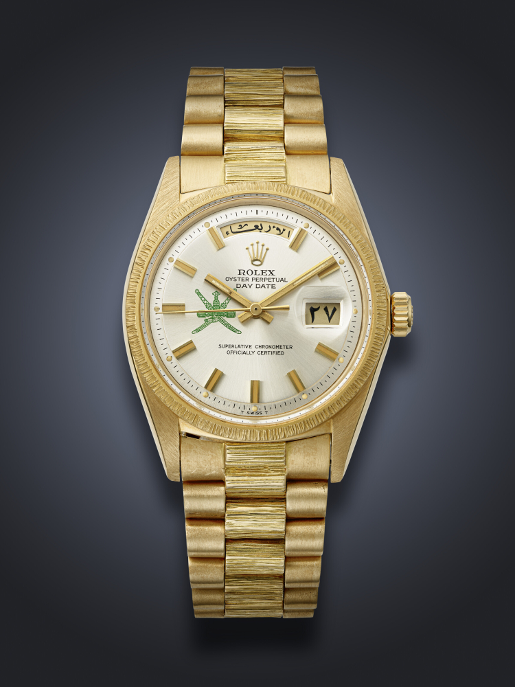 ROLEX, YELLOW GOLD 'DAY-DATE', WITH GREEN KHANJAR SYMBOL, REF. 1811