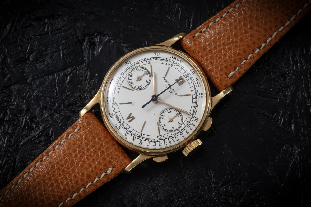 PATEK PHILIPPE, REF. 130, A FINE YELLOW GOLD MANUAL-WINDING CHRONOGRAPH 