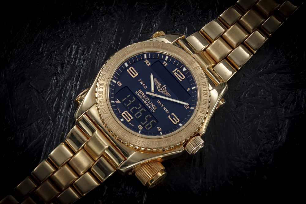 BREITLING, EMERGENCY, A LIMITED EDITION GOLD WRISTWATCH WITH DISTRESS BEACON