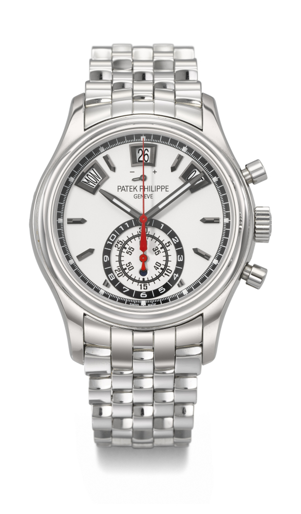 PATEK PHILIPPE. AN ATTRACTIVE STAINLESS STEEL AUTOMATIC ANNUAL CALENDAR FLYBACK CHRONOGRAPH WRISTWATCH WITH POWER RESERVE, DAY/NIGHT INDICATOR AND BRACELET