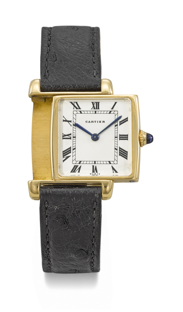 CARTIER. A RARE AND ATTRACTIVE 18K GOLD REVERSO WRISTWATCH