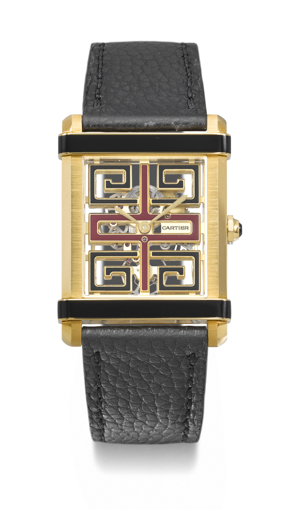 CARTIER. A RARE AND DISTINGUISHED 18K GOLD LIMITED EDITION SKELETONIZED WRISTWATCH