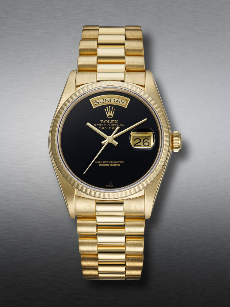 ROLEX, YELLOW GOLD 'DAY-DATE', WITH ONYX DIAL, REF. 18168