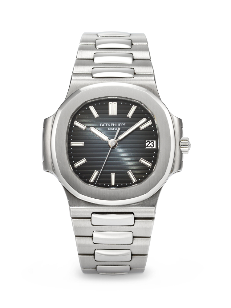 PATEK PHILIPPE. A VERY RARE STAINLESS STEEL AUTOMATIC WRISTWATCH WITH SWEEP CENTER SECONDS, DATE, AND BRACELET