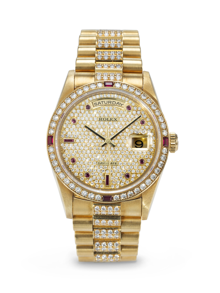 ROLEX. A VERY RARE AND HIGHLY ATTRACTIVE 18K GOLD, DIAMOND AND RUBY-SET AUTOMATIC WRISTWATCH WITH SWEEP CENTER SECONDS, DAY, DATE AND BRACELET