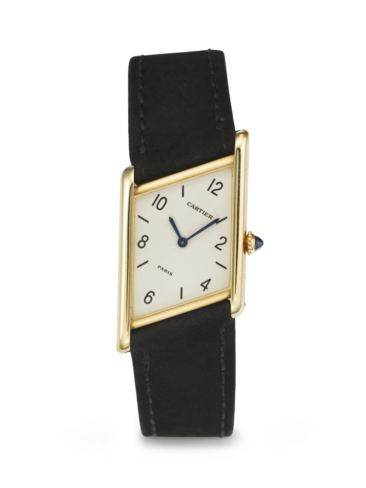 CARTIER. A RARE AND UNUSUAL 18K GOLD LIMITED EDITION ASYMMETRICAL WRISTWATCH