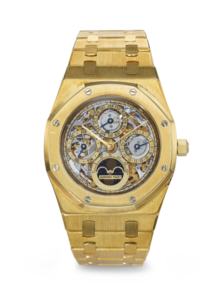 AUDEMARS PIGUET. A VERY RARE AND ATTRACTIVE 18K GOLD AUTOMATIC SKELETONIZED PERPETUAL CALENDAR WRISTWATCH WITH MOON PHASES AND BRACELET