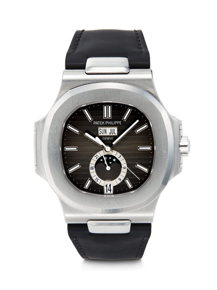 PATEK PHILIPPE. AN ATTRACTIVE STAINLESS STEEL AUTOMATIC ANNUAL CALENDAR WRISTWATCH WITH SWEEP CENTRE SECONDS, MOON PHASES AND 24-HOUR INDICATION