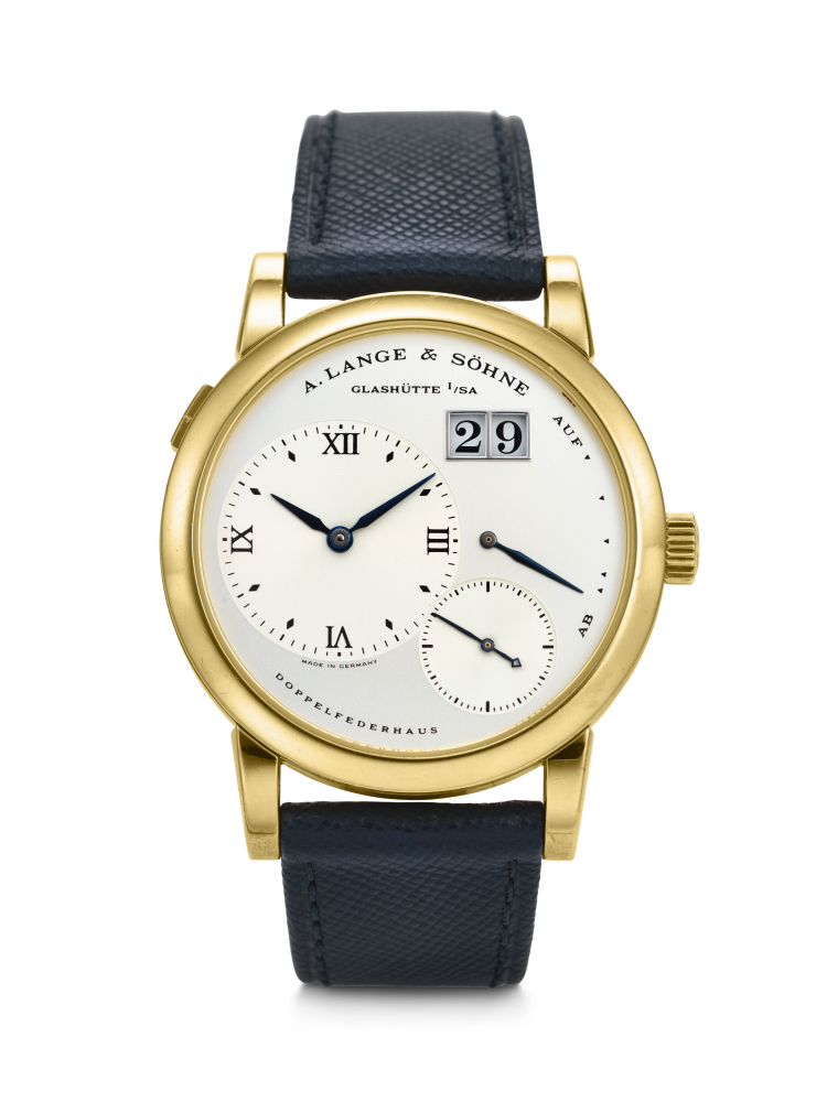 A. LANGE SÖHNE. AN EARLY AND DESIRABLE 18K GOLD WRISTWATCH WITH OUTSIZED DATE AND POWER RESERVE INDICATION