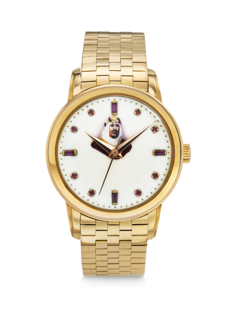 PATEK PHILIPPE. AN EXTREMELY RARE 18K PINK GOLD AND RUBY-SET WRISTWATCH WITH SWEEP CENTRE SECONDS, ENAMEL DIAL AND BRACELET, MADE IN HOMAGE OF KING BIN ABDULAZIZ AL SAUD