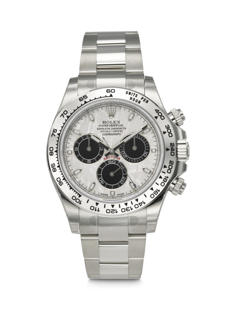 ROLEX. A VERY RARE AND STICKERED 18K WHITE GOLD AUTOMATIC CHRONOGRAPH WRISTWATCH WITH METEORITE DIAL