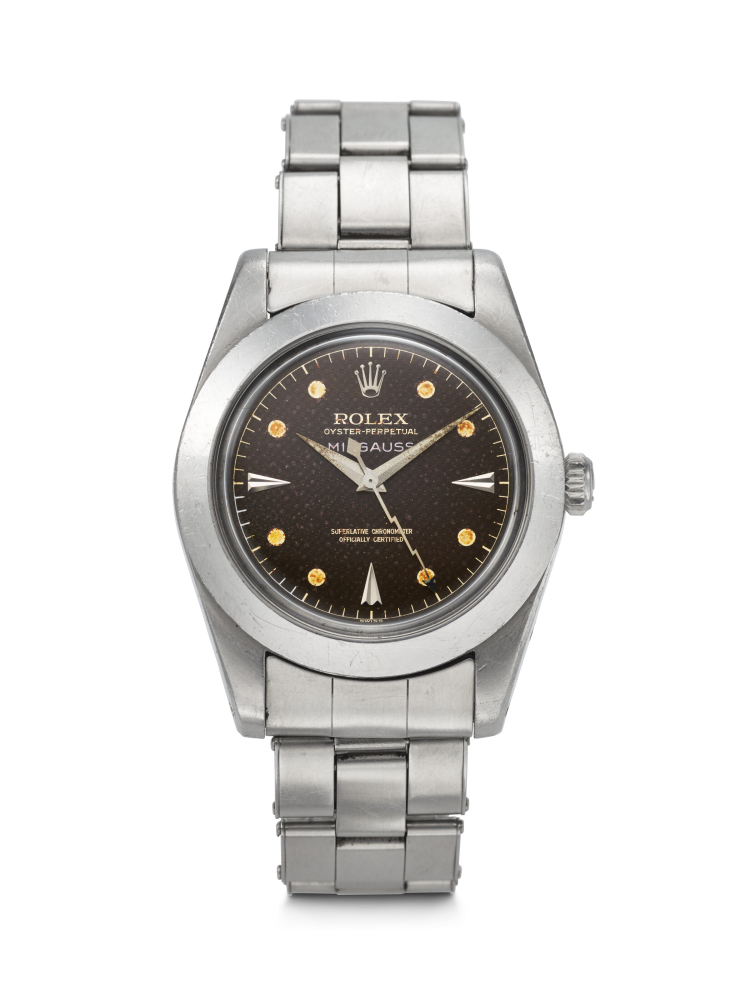 ROLEX. A SUPERB AND HISTORICALLY IMPORTANT STAINLESS STEEL AUTOMATIC WRISTWATCH WITH SWEEP CENTRE SECONDS, TROPICAL DIAL AND BRACELET, FORMERLY OWNED BY A CIA OPERATOR AT THE BAY OF PIGS INVASION
