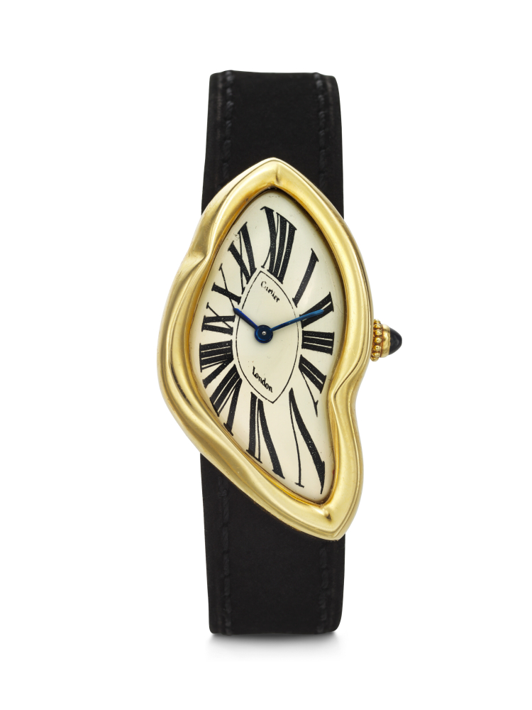 CARTIER. A SUPREMELY RARE, UNUSUAL AND HIGHLY COVETED 18K GOLD ASYMMETRICAL WRISTWATCH WITH ‘CRASH’ DEPLOYANT CLASP