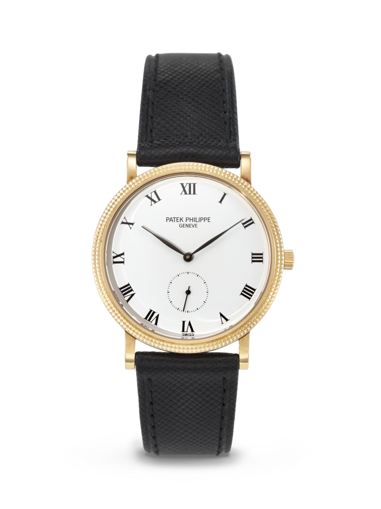 PATEK PHILIPPE, YELLOW GOLD 'CALATRAVA', WITH 'CLOUS DE PARIS' BEZEL AND PORCELAIN DIAL, REF. 3919