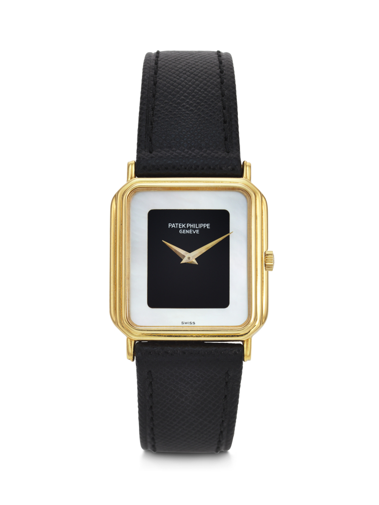 PATEK PHILIPPE, RARE YELLOW GOLD RECTANGULAR-SHAPED WRISTWATCH WITH ONYX AND MOTHER OF PEARL DIAL, REF. 3859