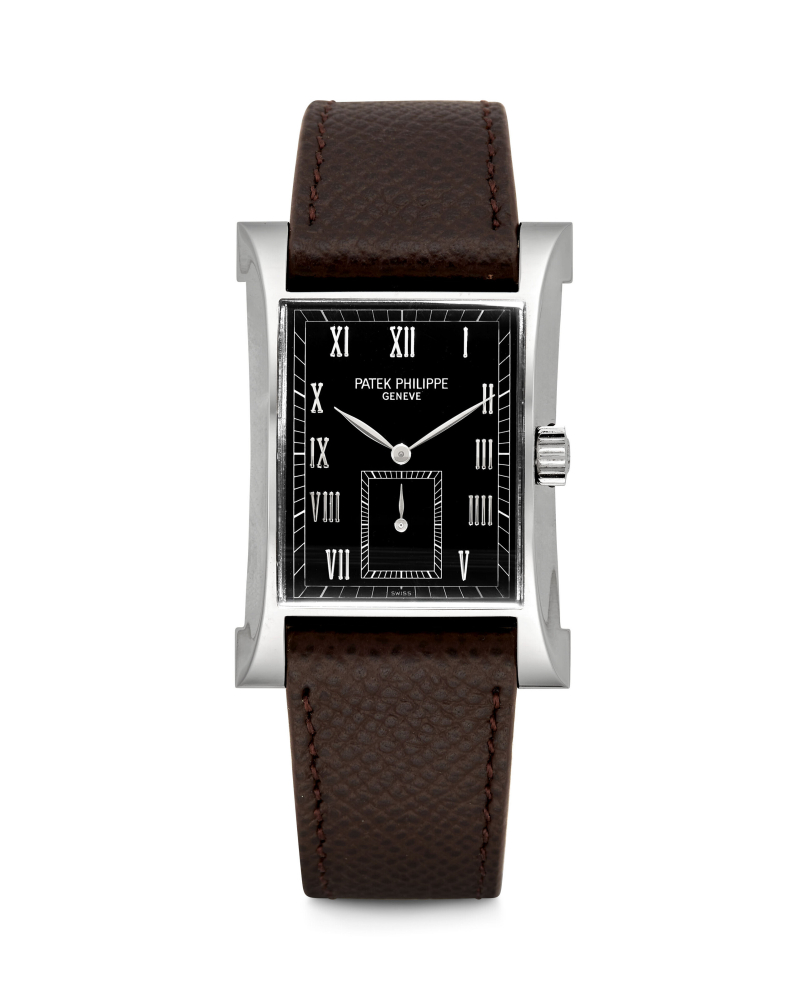 PATEK PHILIPPE. A VERY RARE AND ATTRACTIVE PLATINUM LIMITED EDITION RECTANGULAR WRISTWATCH, MADE TO COMMEMORATE THE INAUGURATION OF PATEK PHILIPPE’S NEW WATCHMAKING CENTRE IN 1997