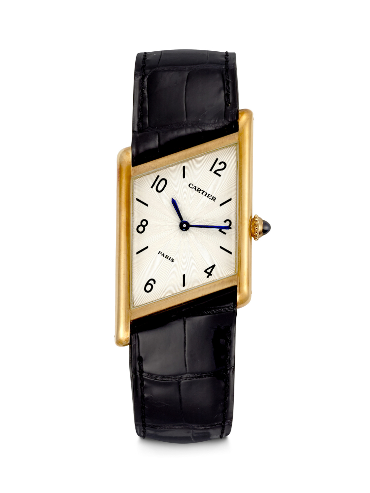 CARTIER. AN UNUSUAL 18K GOLD LIMITED EDITION ASYMMETRICAL WRISTWATCH