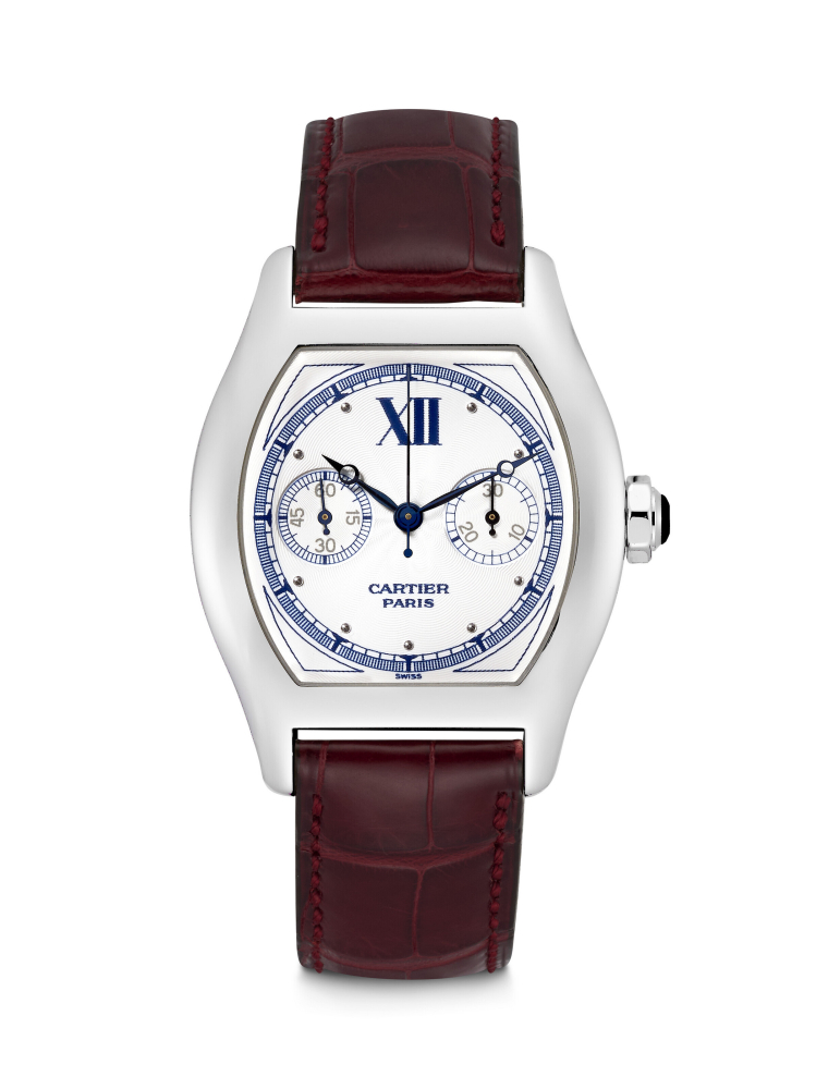 CARTIER. AN 18K WHITE GOLD TONNEAU SHAPED SINGLE BUTTON CHRONOGRAPH WRISTWATCH