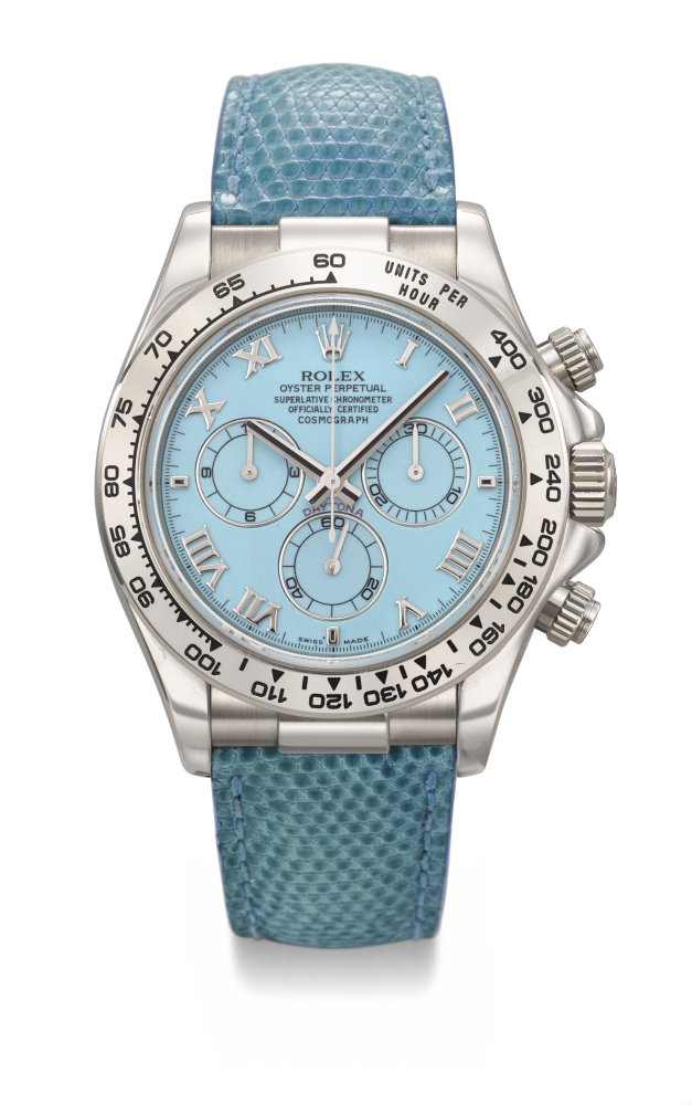 ROLEX. A RARE AND VIBRANT 18K WHITE GOLD AUTOMATIC CHRONOGRAPH WRISTWATCH WITH TURQUOISE DIAL