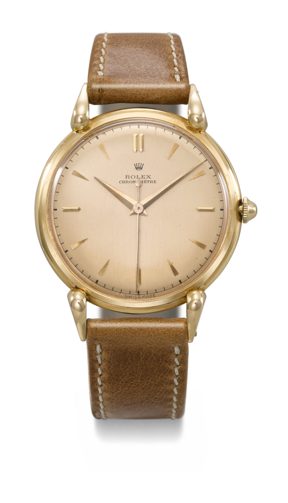 ROLEX. AN EXTREMELY RARE AND UNUSUAL 18K PINK GOLD WRISTWATCH WITH FANCY LUGS AND PINK DIAL
