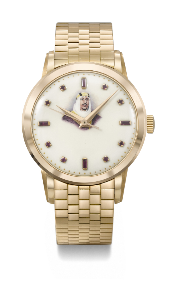 PATEK PHILIPPE. AN EXTREMELY RARE 18K PINK GOLD AND RUBY-SET WRISTWATCH WITH SWEEP CENTRE SECONDS, ENAMEL DIAL AND BRACELET, MADE IN HOMAGE OF KING BIN ABDULAZIZ AL SAUD