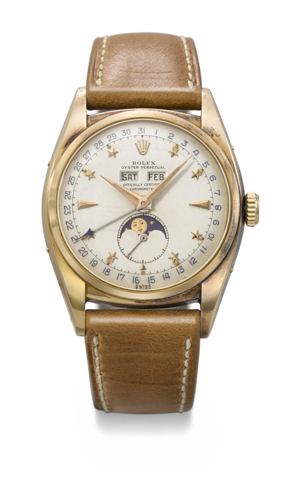ROLEX. AN EXCEEDINGLY RARE AND OUTSTANDINGLY WELL PRESERVED 18K PINK GOLD AUTOMATIC TRIPLE CALENDAR WRISTWATCH WITH MOON PHASES AND STAR HOUR MARKERS