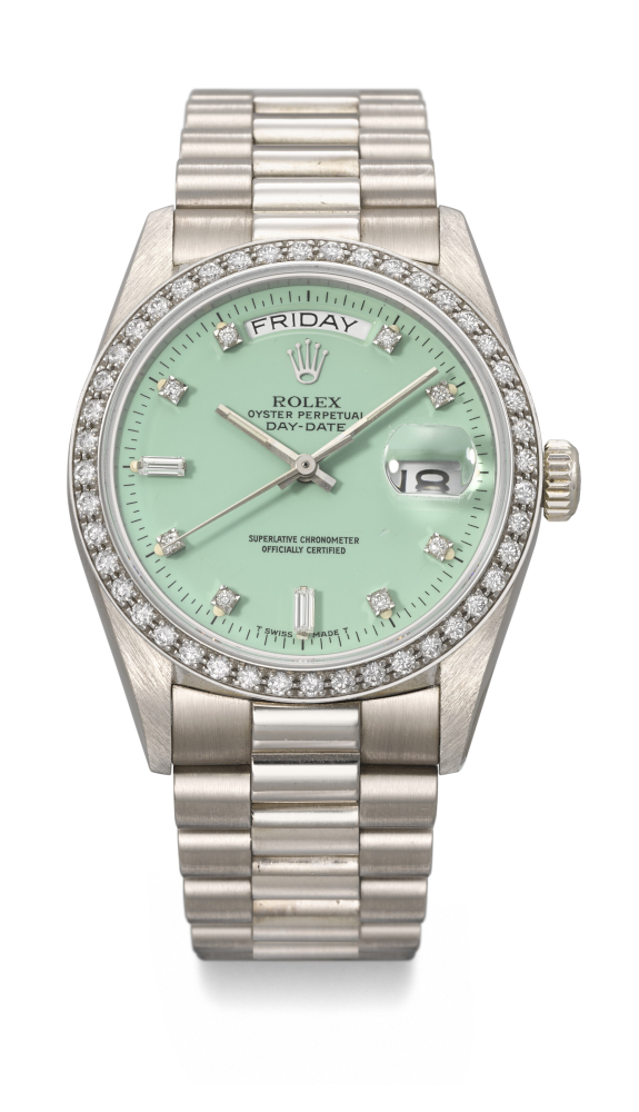 ROLEX. AN EXTREMELY RARE AND VIBRANT 18K WHITE GOLD AND DIAMOND-SET AUTOMATIC WRISTWATCH WITH SWEEP CENTRE SECONDS, DAY, DATE, BABY GREEN LACQUERED 'STELLA' DIAL AND BRACELET