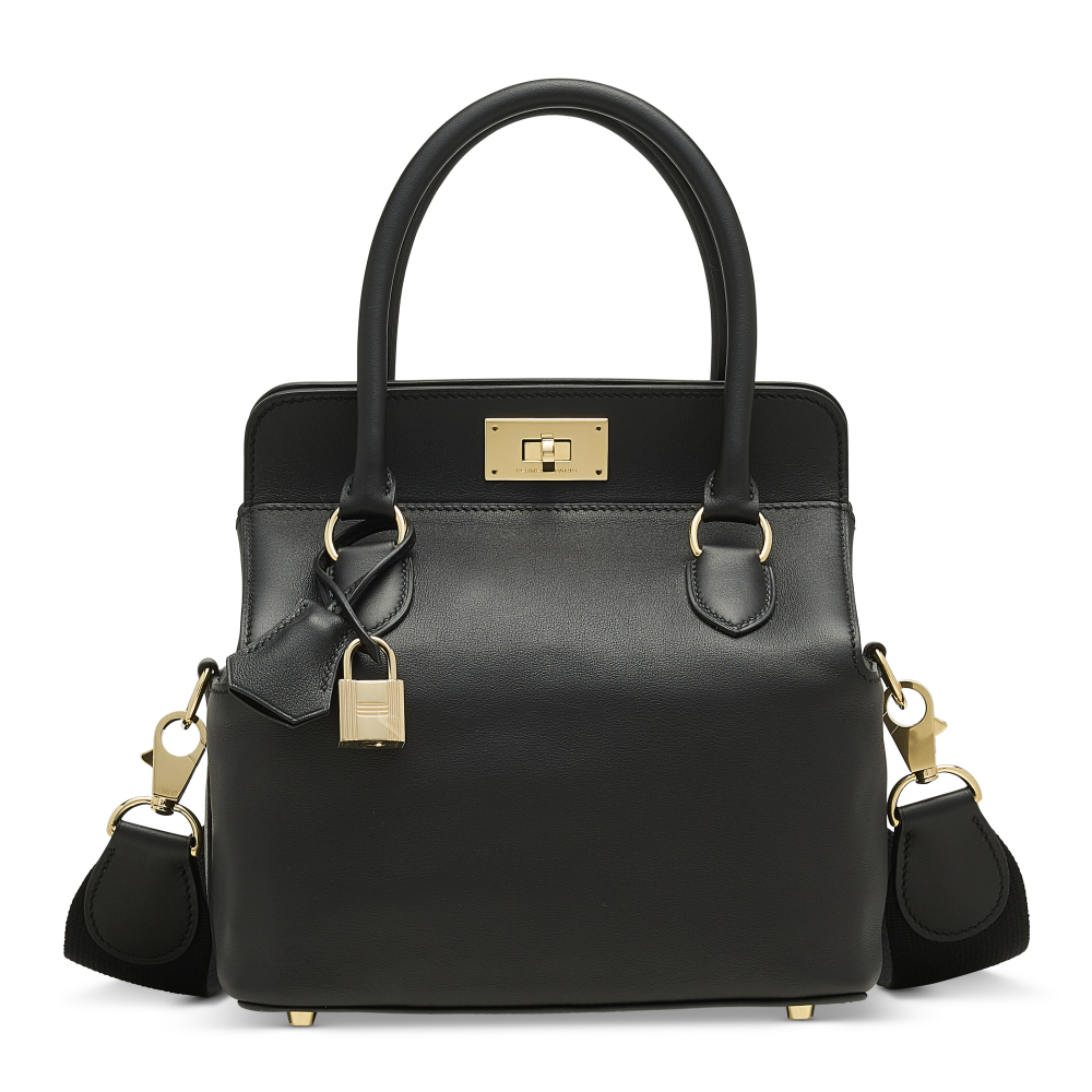 A BLACK SWIFT LEATHER TOOLBOX 20 WITH GOLD HARDWARE