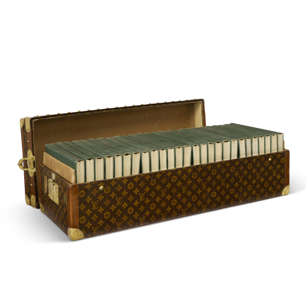 A RARE, MONOGRAM CANVAS LIBRARY TRUNK WITH SET OF 1911 BRITANNICA ENCYCLOPAEDIA WITH BRASS HARDWARE LOUIS VUITTON, CIRCA 1911 Important information about this lot
