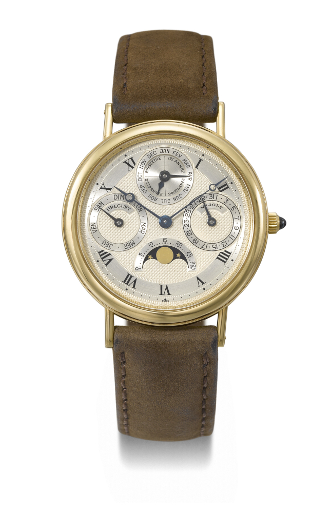 BREGUET. AN ELEGANT 18K GOLD AUTOMATIC PERPETUAL CALENDAR WRISTWATCH WITH MOON PHASES AND LEAP YEAR INDICATION