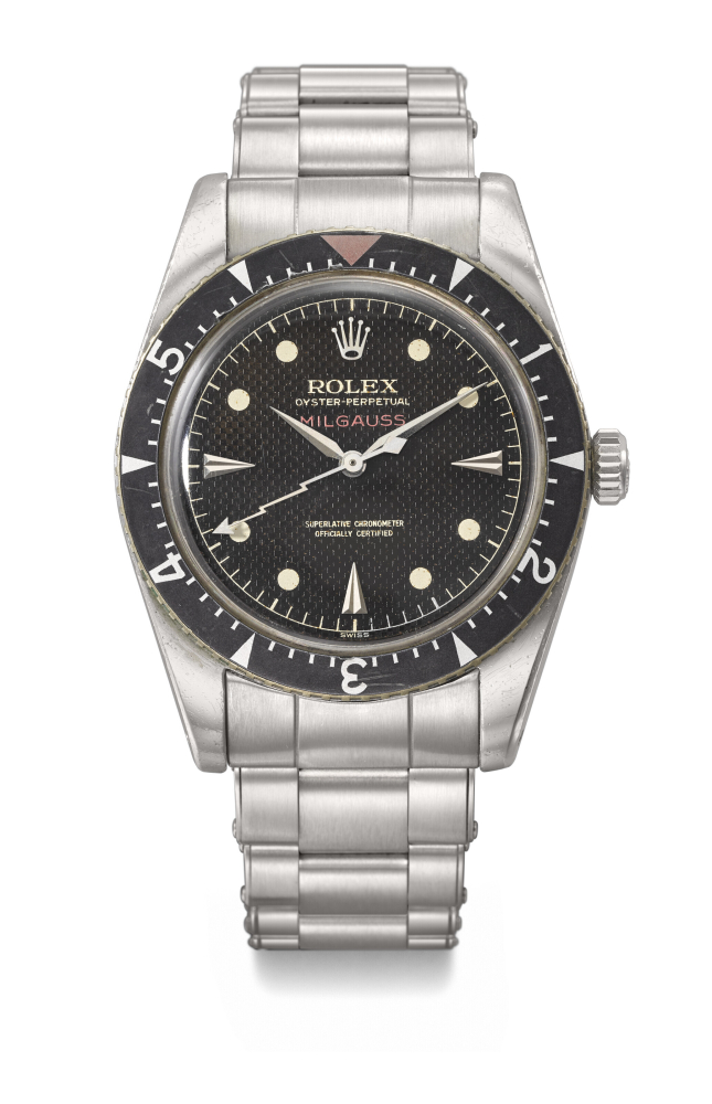 ROLEX. AN EXCEEDINGLY RARE AND IMPORTANT STAINLESS STEEL AUTOMATIC WRISTWATCH WITH BLACK HONEYCOMB DIAL AND BRACELET