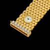 CARTIER. A LADY’S VINTAGE AND UNUSUAL 18K GOLD AND DIAMOND-SET BRACELET WATCH WITH “SECRET” DIAL
