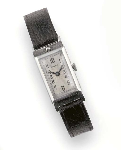 ROLEX, AN UNUSUAL STEEL RECTANGULAR REVERSIBLE WRISTWATCH.signed Rolex, Ref:2442, circa 1935.