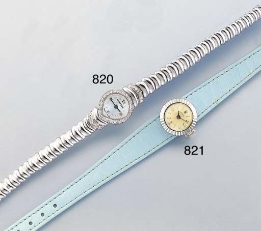 ROLEX. A LADY'S 18K WHITE GOLD WRISTWATCH