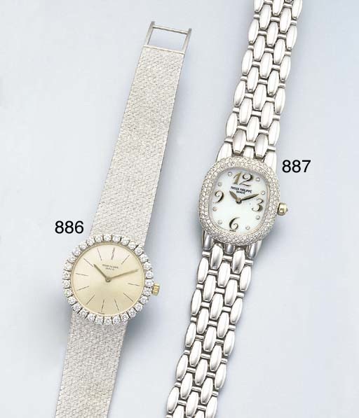 PATEK PHILIPPE. A LADY'S 18K WHITE GOLD AND DIAMOND-SET WRISTWATCH WITH BRACELET