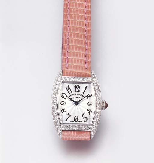 FRANCK MULLER. A LADY'S 18K WHITE GOLD AND DIAMOND-SET TONNEAU-SHAPED WRISTWATCH