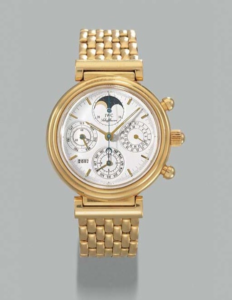 IWC. An 18K gold self-winding perpetual calendar chronograph wristwatch with phases of the moon and bracelet