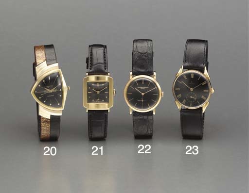 Rolex. An 18K gold wristwatch with fancy lugs
