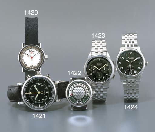 GERALD GENTA. A STAINLESS STEEL SELF-WINDING JUMP HOUR WRISTWATCH