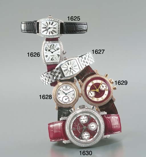FRANCK MULLER. A LADY'S 18K WHITE GOLD AND DIAMOND-SET TONNEAU-SHAPED WRISTWATCH